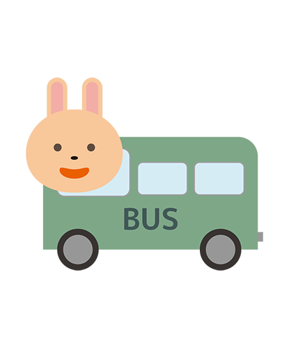 スクールバスに乗ったうさぎキャラクターのイラスト